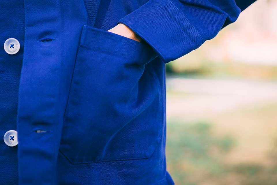La veste de travail bleu